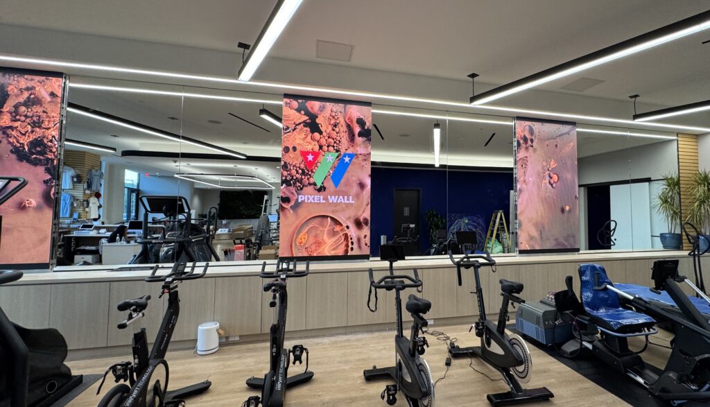 Three video walls in a gym